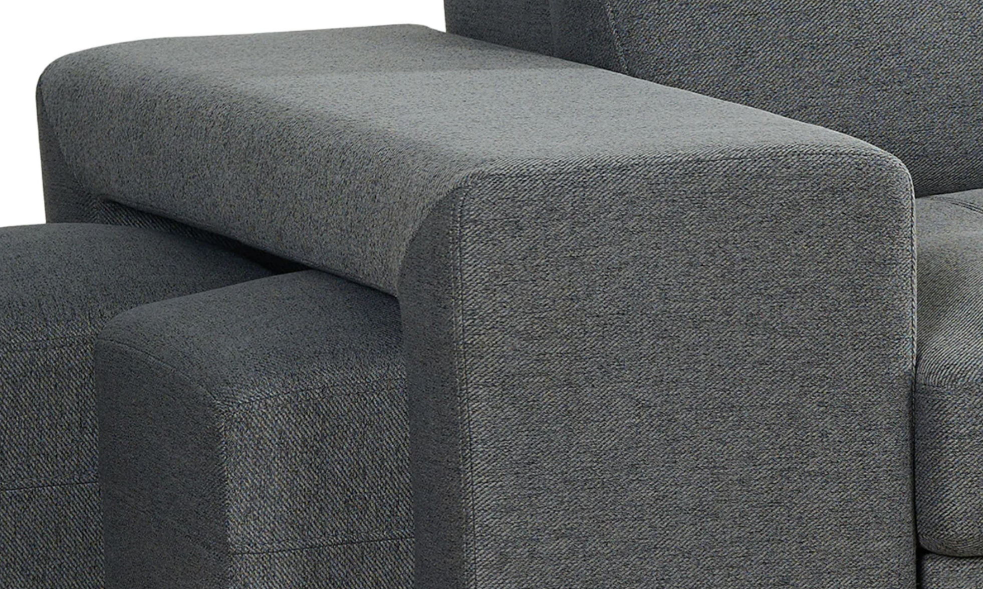 Gray fabric sofa with a close-up of the corner.