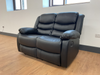 Conrad Black Faux Leather Manual Reclining Sofas
