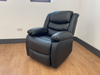 Conrad Black Faux Leather Manual Reclining Sofas