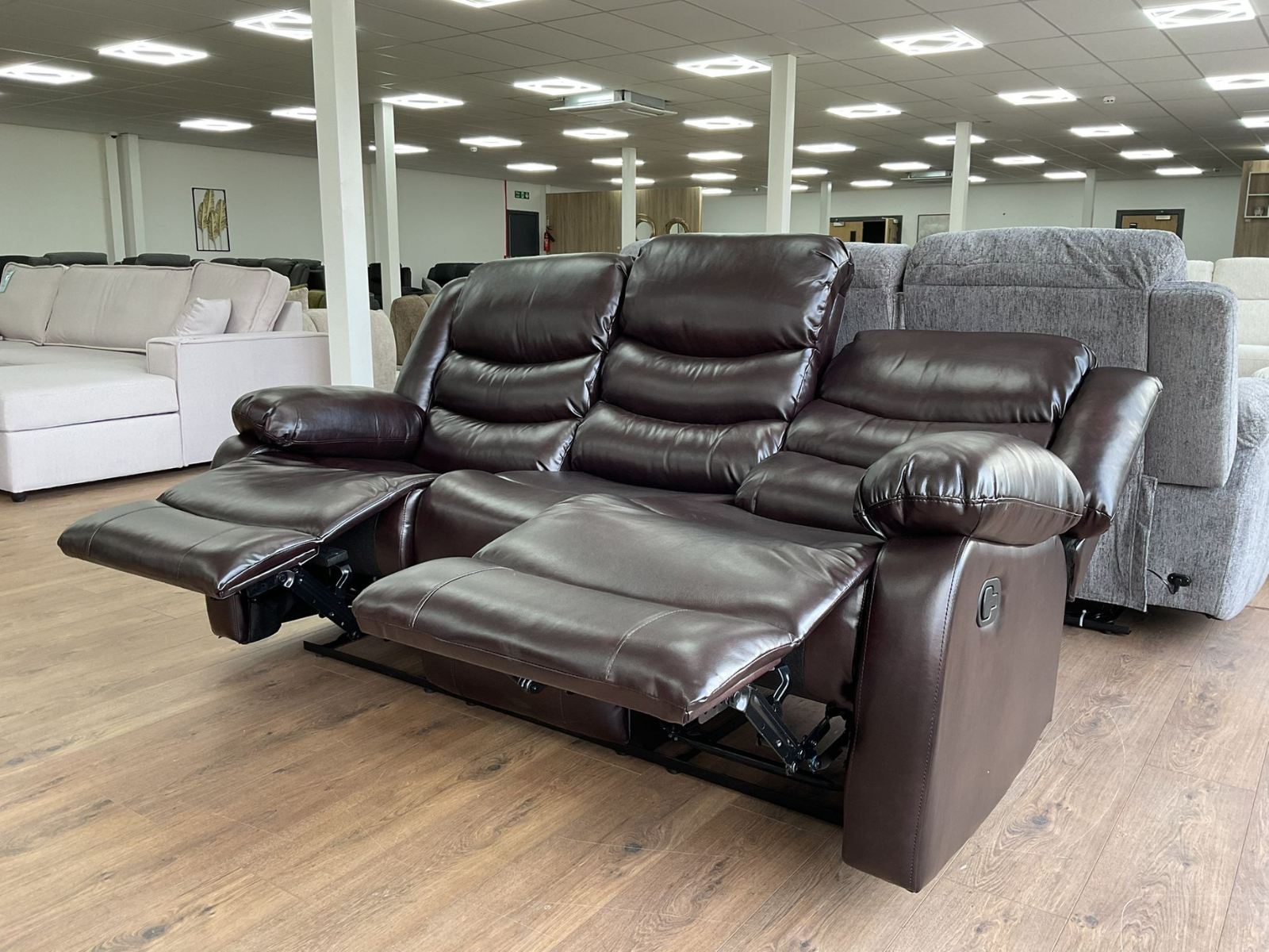 Rico Brown Faux Leather Manual Reclining Sofas