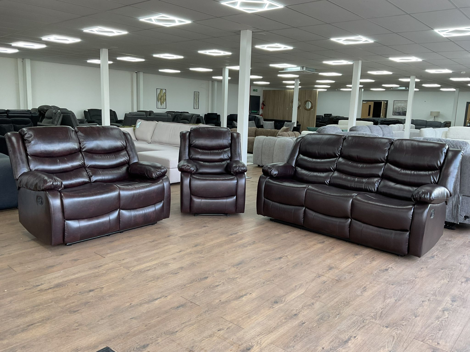 Rico Brown Faux Leather Manual Reclining Sofas